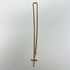 Golden necklace with cross